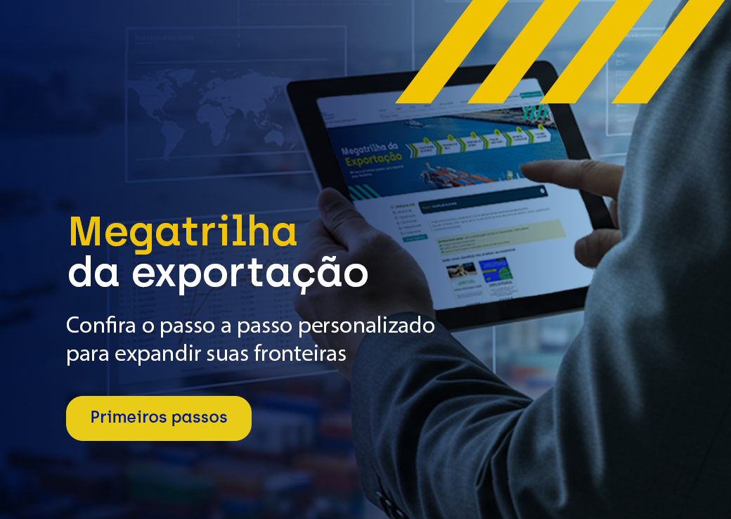 Imagem de empresário mexendo em tablet- Navegue pela megatrilha da exportação